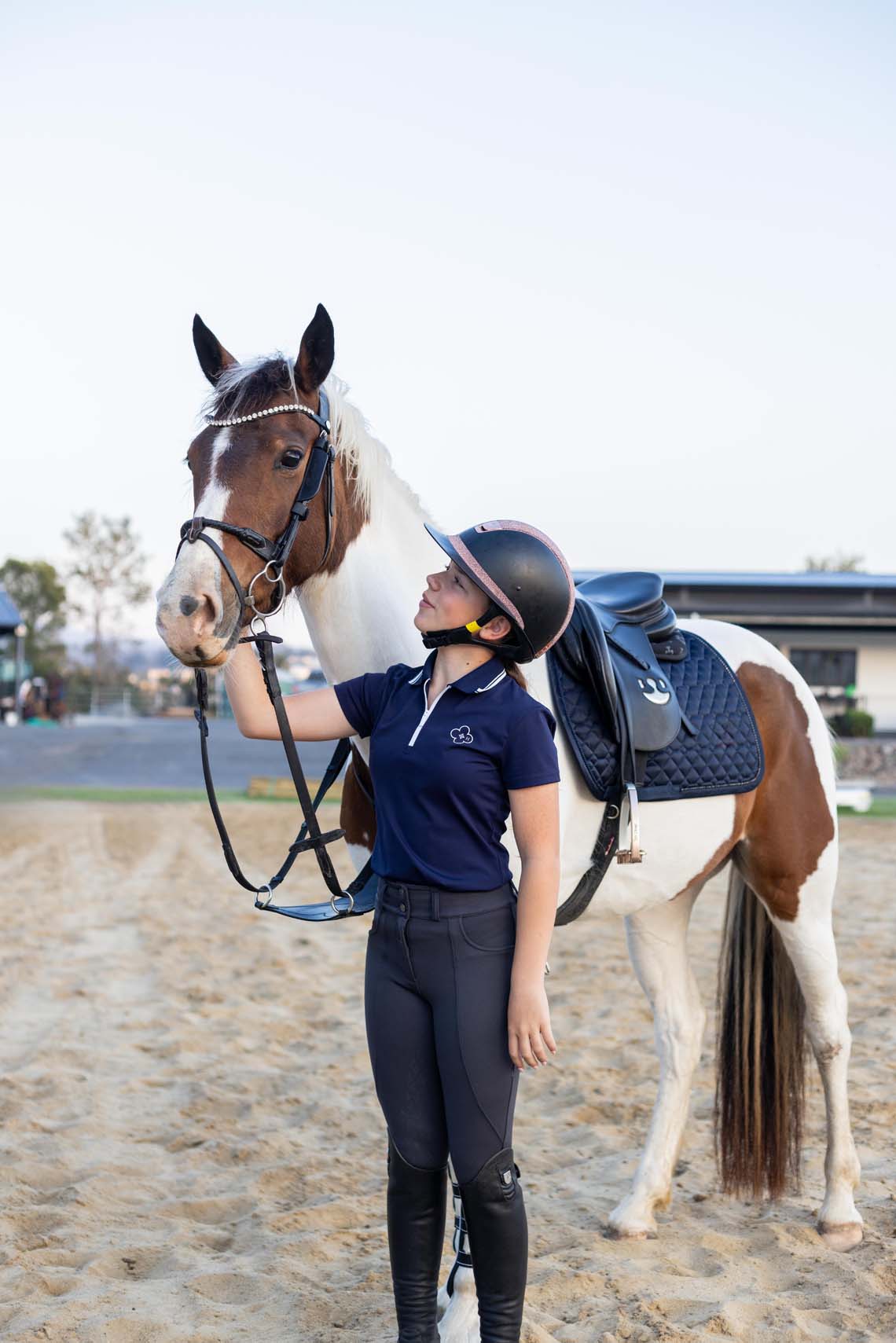 Navy blue riding polo with breathable fabric and stretch comfort