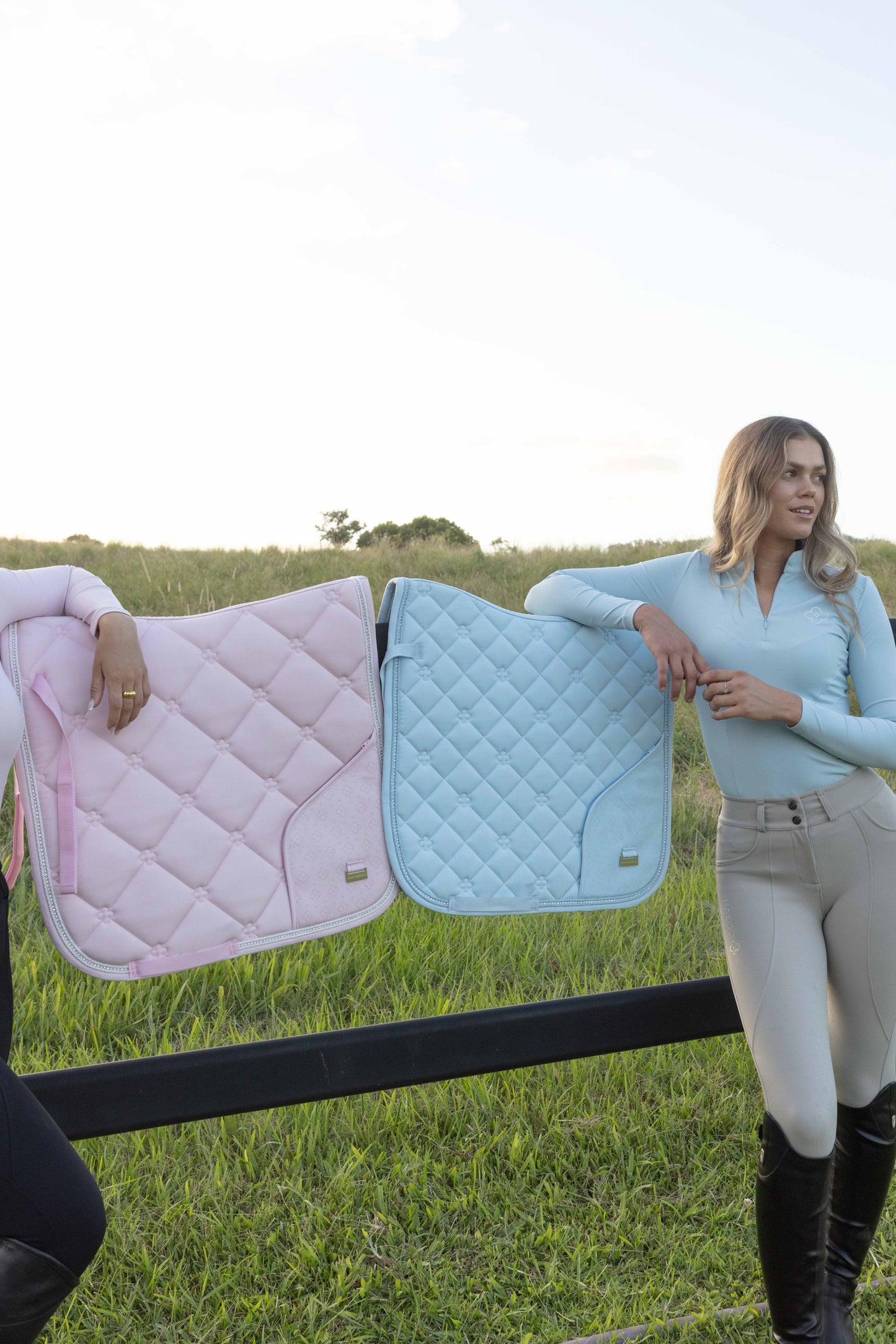 Light blue riding saddle pad with elegant design and phone pocket