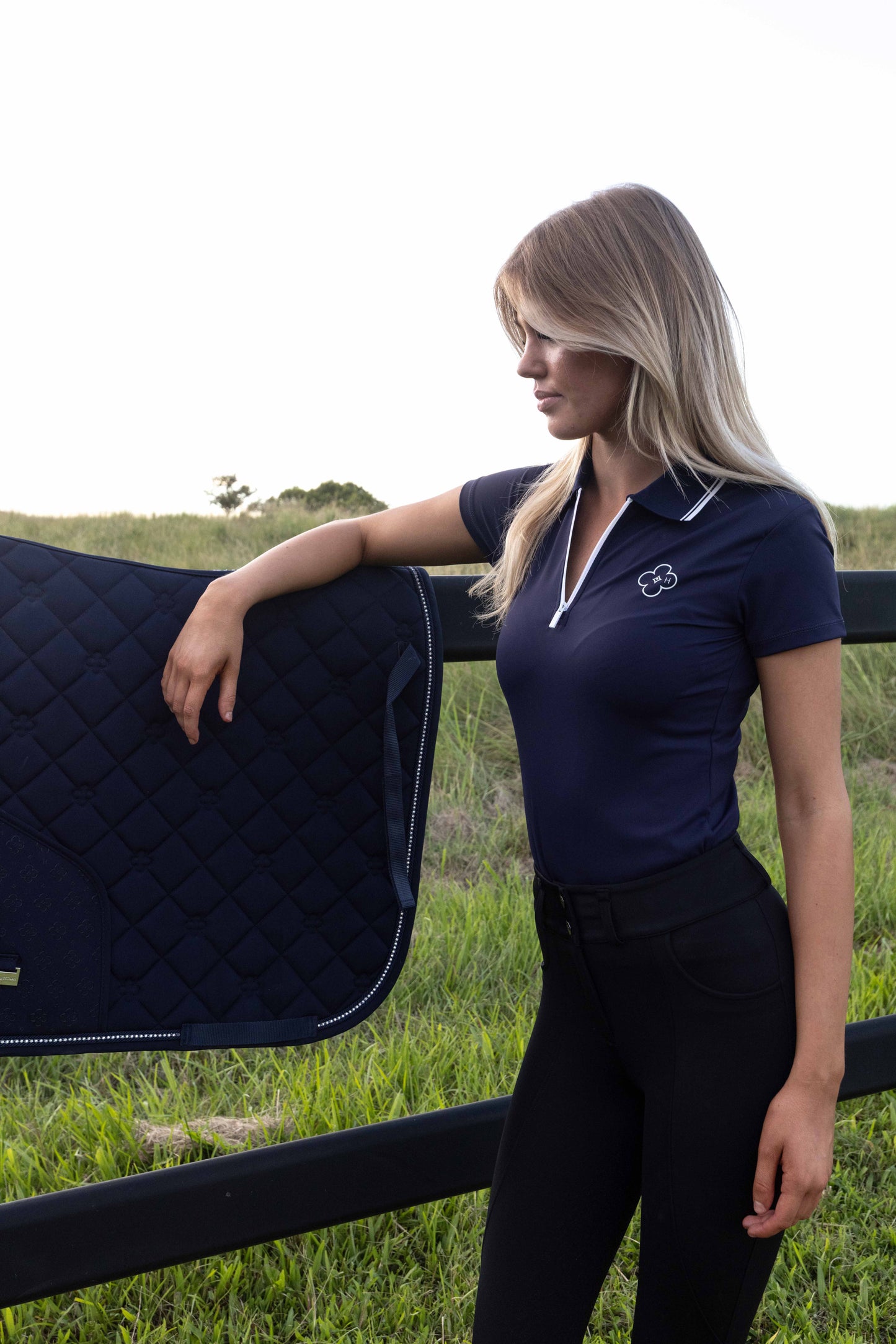 Classic navy riding saddle pad with innovative phone pocket technology