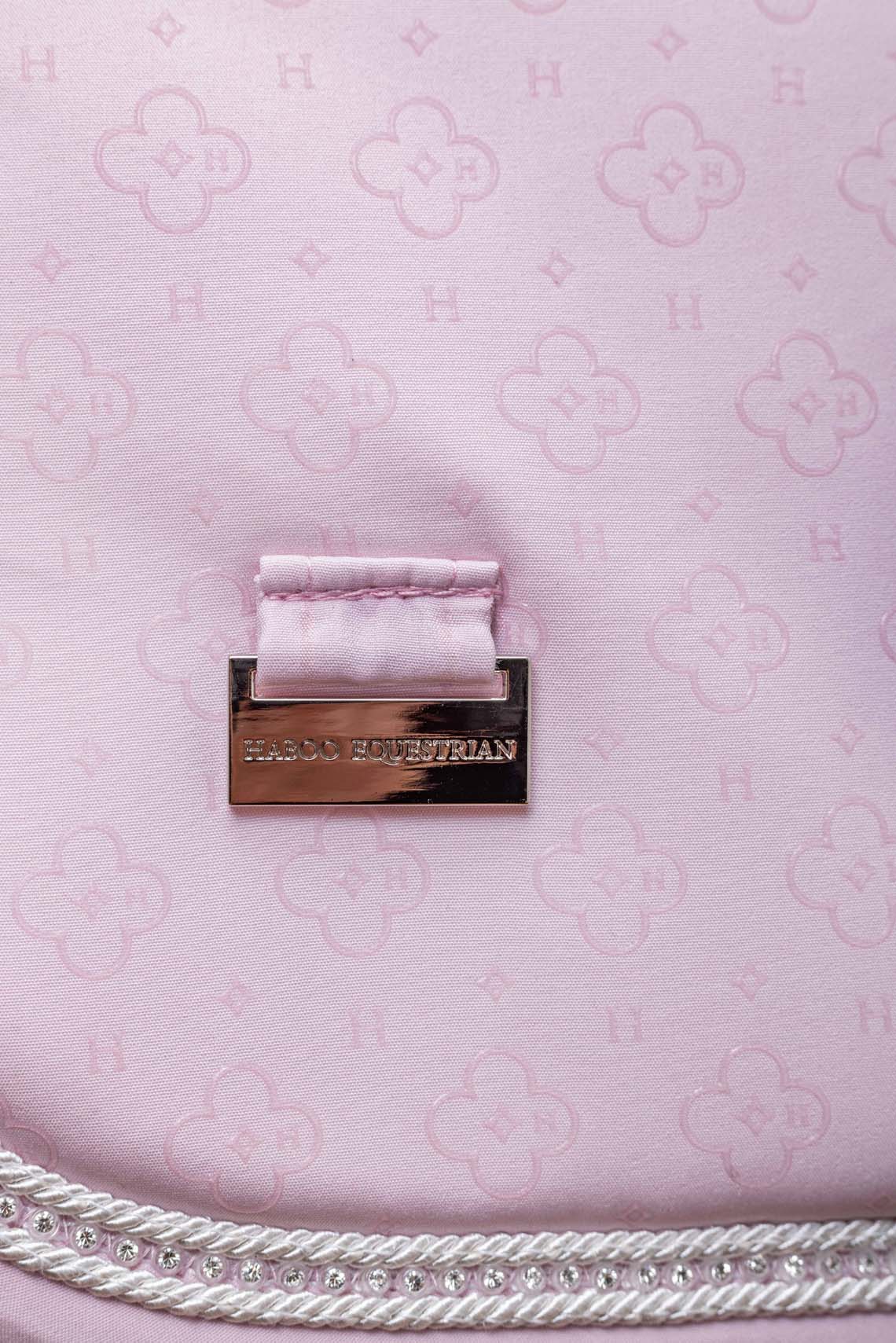 Baby pink saddle pad fabric detail showing quality construction